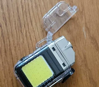 چراغ led + فندک الکتریکی شیشه ای (دارای قفل درپوش)